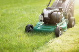 Lawn mower on a grassy lawn

